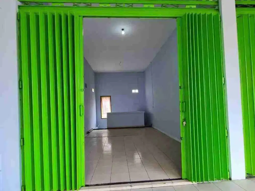 dijual tanah + 3 unit toko+12 kamar kost.lokasi dalung