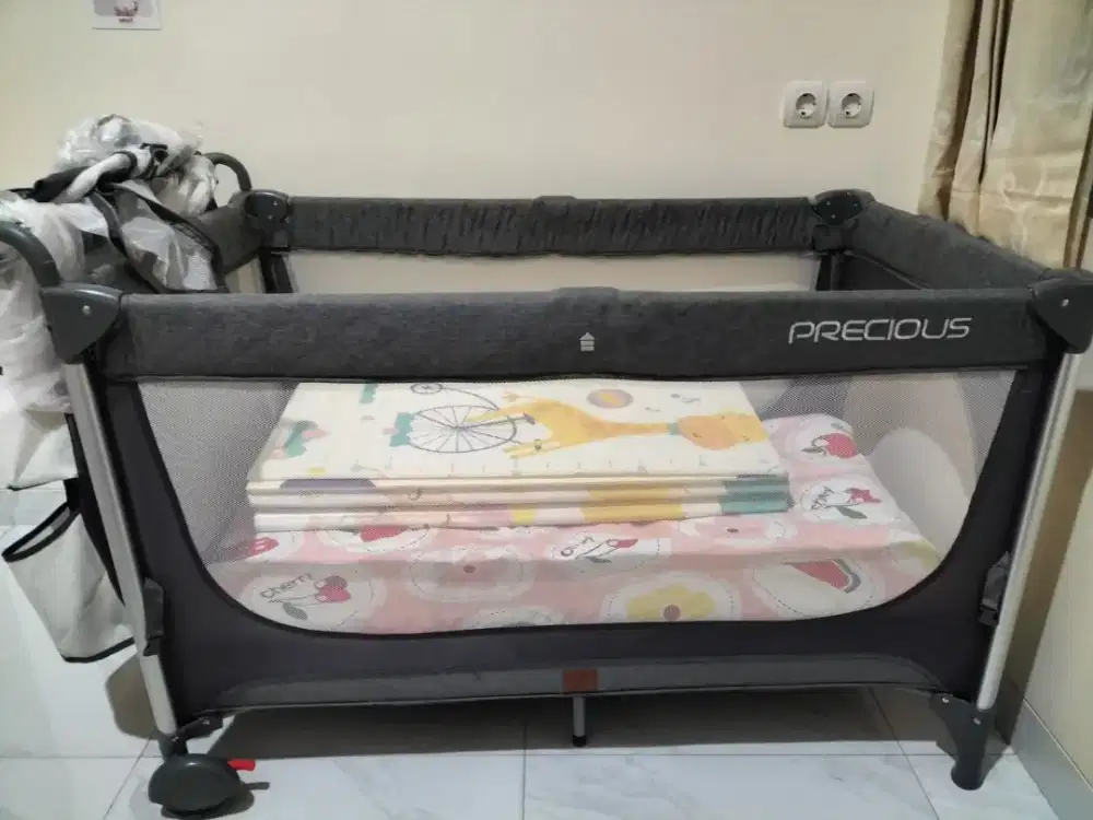 Precius tempat tidur baby