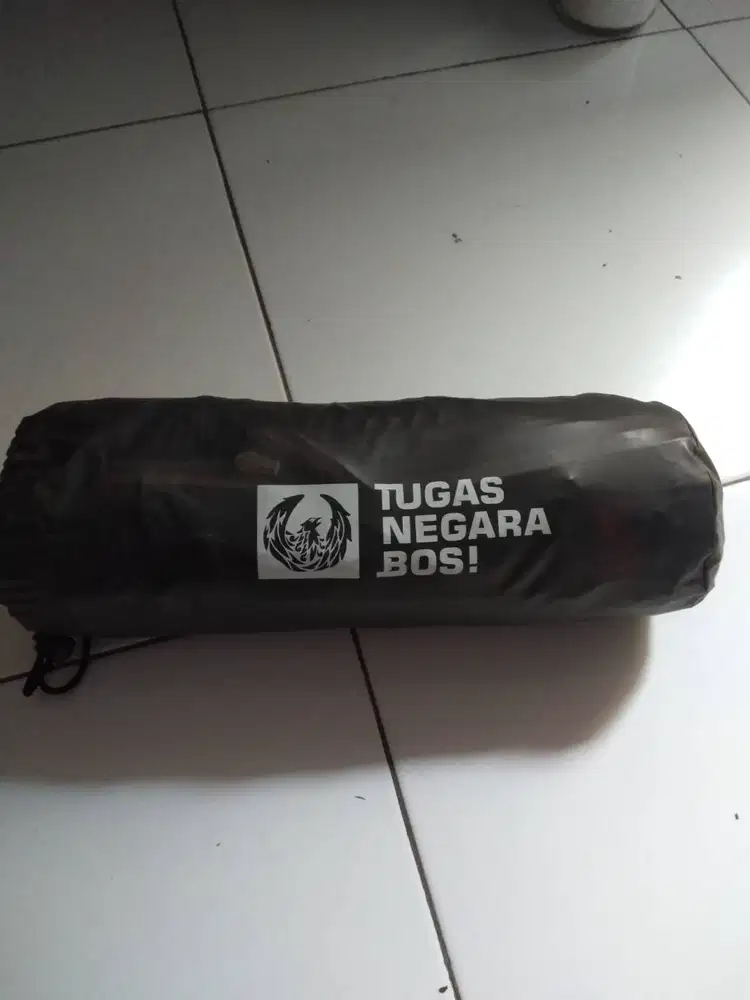 Jas hujan asli tugas negara