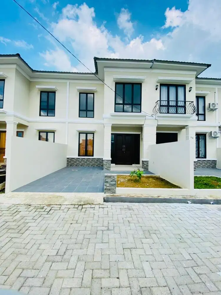 RUMAH CLASSIC 2 LANTAI DEKAT USU