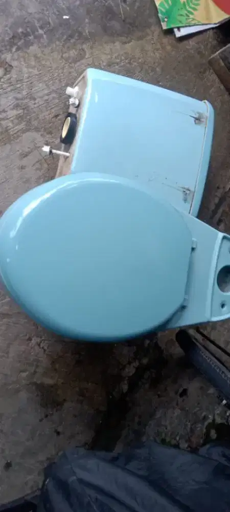 Closet duduk merek ina