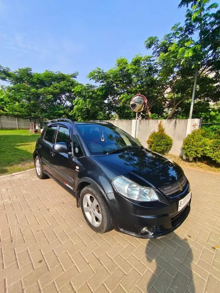 Suzuki SX4 2009 Bensin
