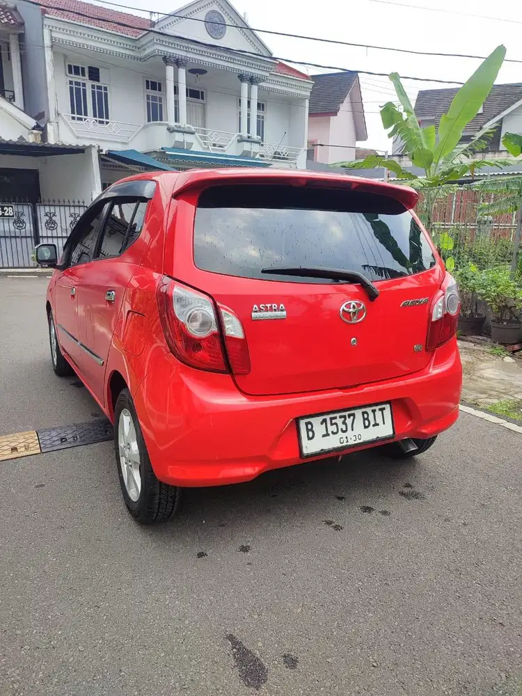 Toyota Agya G at metic Tahun 2015 merah metalik nopol Ganjil jakarta