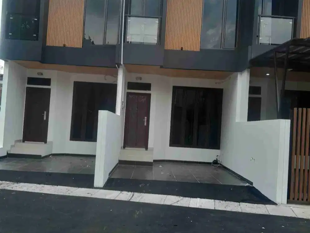 Rumah mewah minimalis modern 2 lantai lokasi strategis  bebas banjir