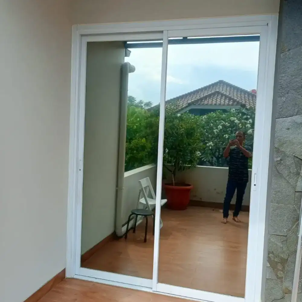 Jasa Pasang Sticker kaca film Rumah