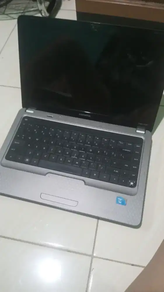 Laptop compaq minus tombol hilang satu