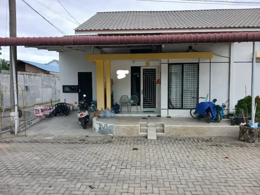 Di jual rumah villa marelan