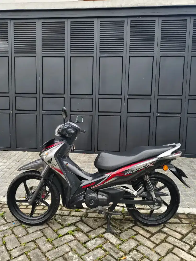 Supra x helm in 125 tahun 2014