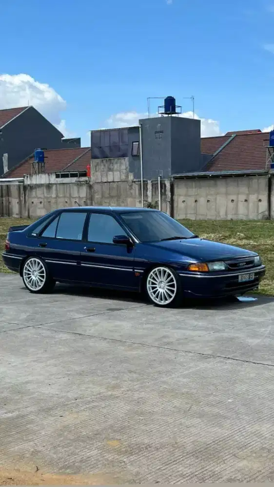 FORD LASER CHAMP MESIN KEMBARAN ASTINA