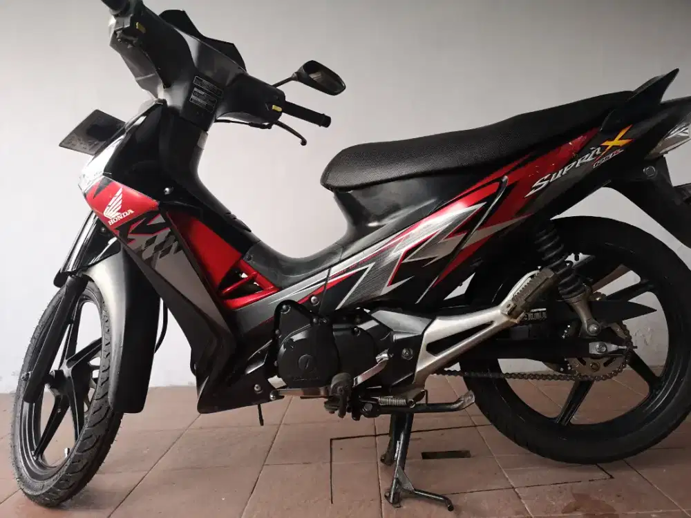 Supra x 125 2011 km 25rb asli ,douboe disk karbu