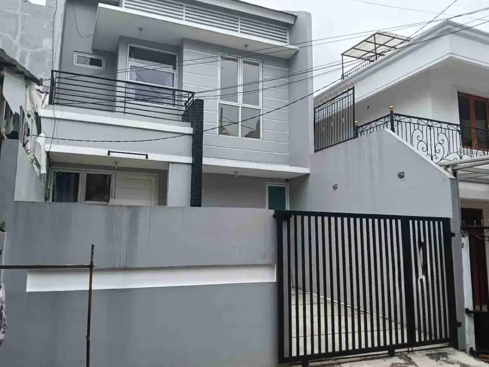 Rumah minimalis rapih 2 lantai row jalan 2 mobil disewakan Tomang Grogol Jakarta Barat