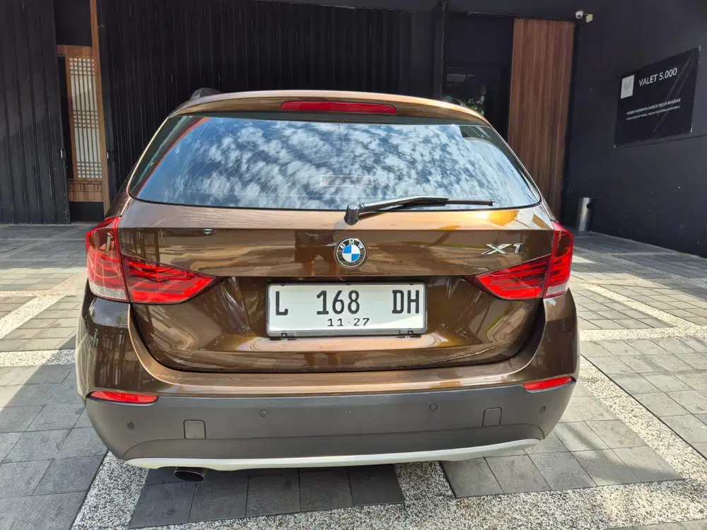 Bmw X1 Coklat metalik 2012 Sdrive 1.8i bensin automatic Record Bmw (L)