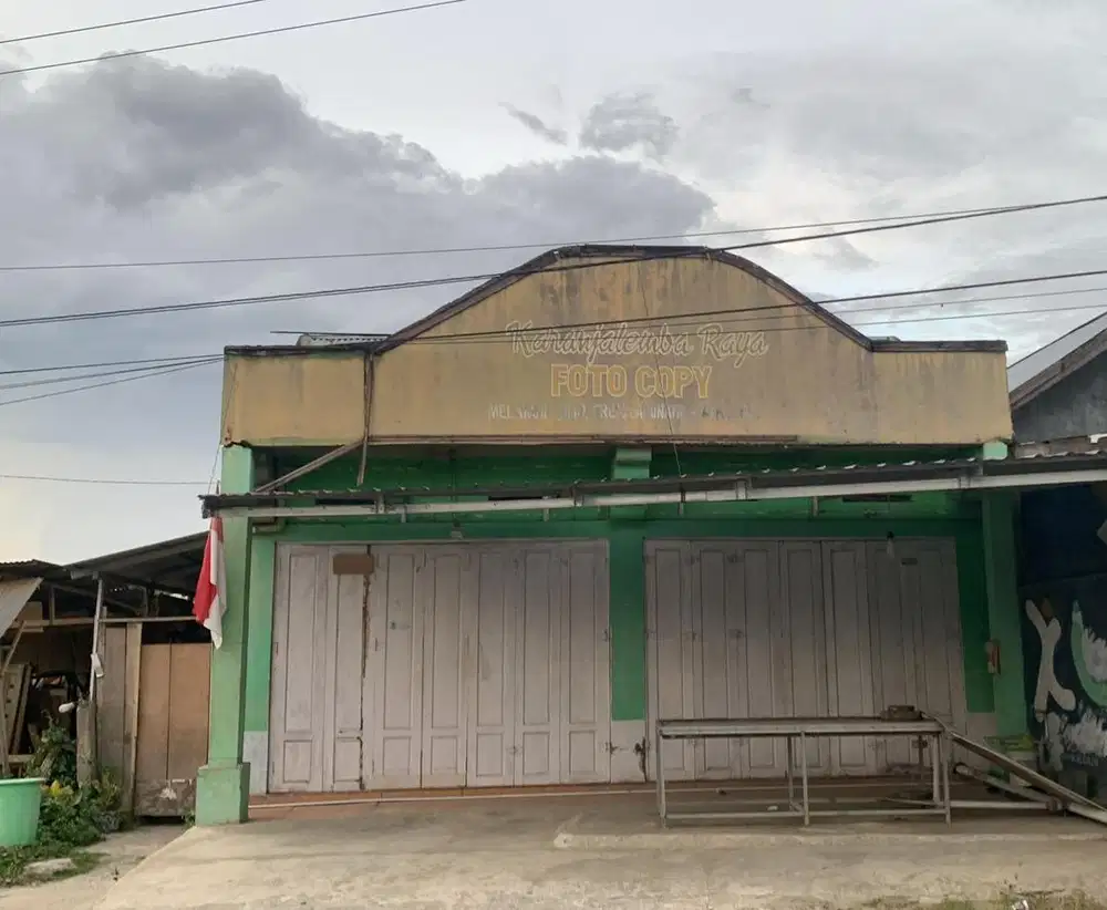 dijual rumah pinggir jalan raya