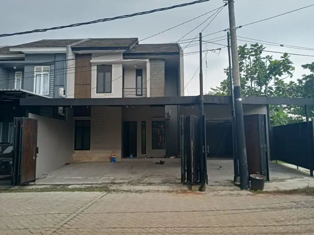 jual dan sewa rumah di binong karawaci tangerang. garasi dan carport sangat besar muat 8 mobil