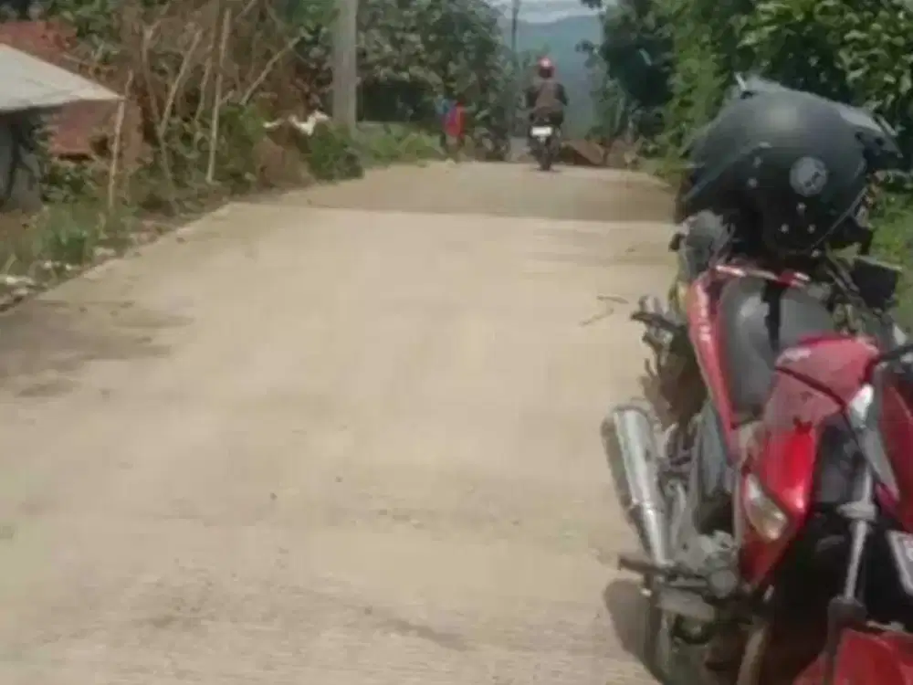 tanah  pinggir jalan di batu karut  arjasari cocok untuk usaha 110 jt