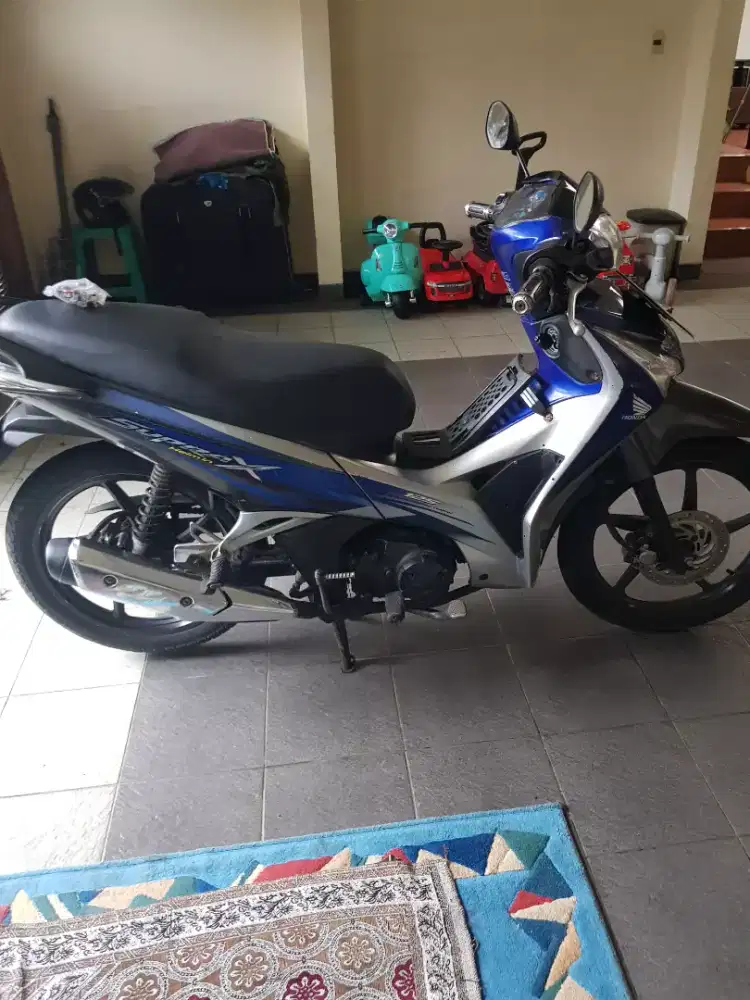 Supra x 125cc helm in masih karburator