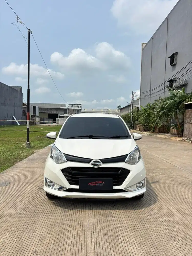 Daihatsu Sigra 1.2 R Deluxe 2016 Automatic ( Putih Metalik )