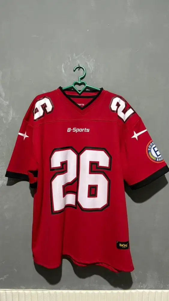 Baju jersey merah