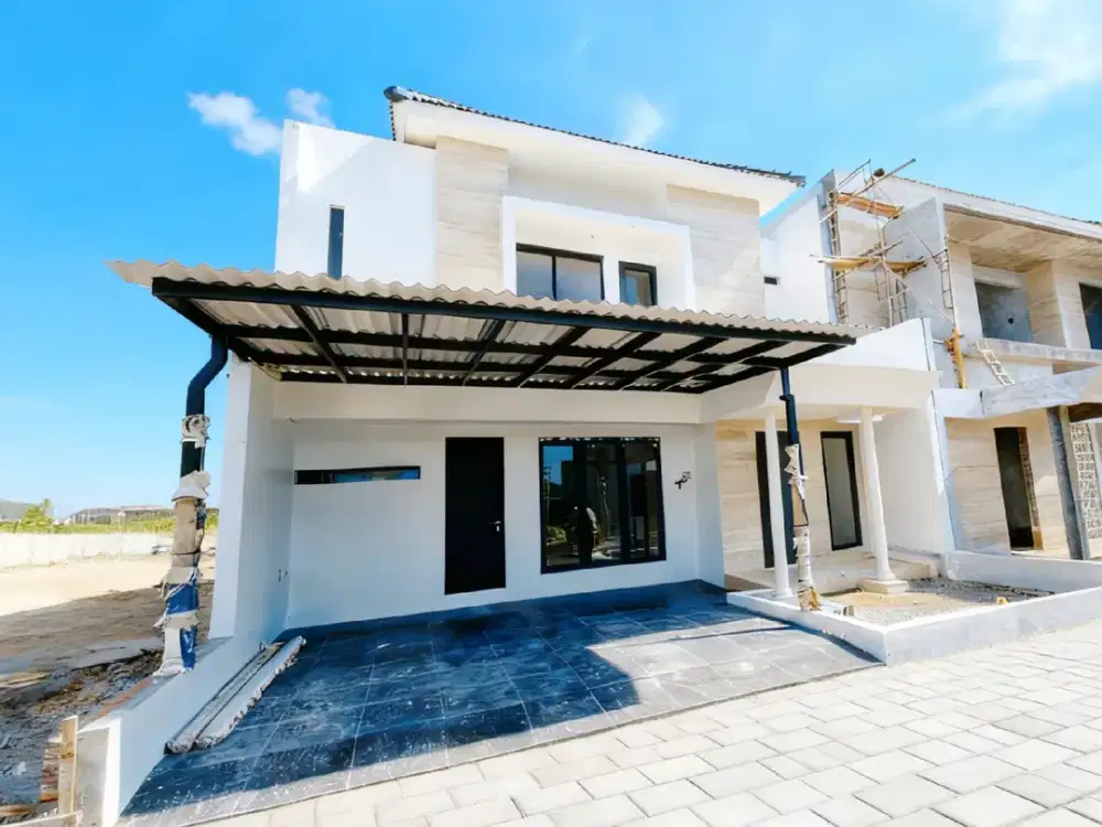 Rumah Cluster One gate 2lantai mewah Dekat kampus Ums di singopuran