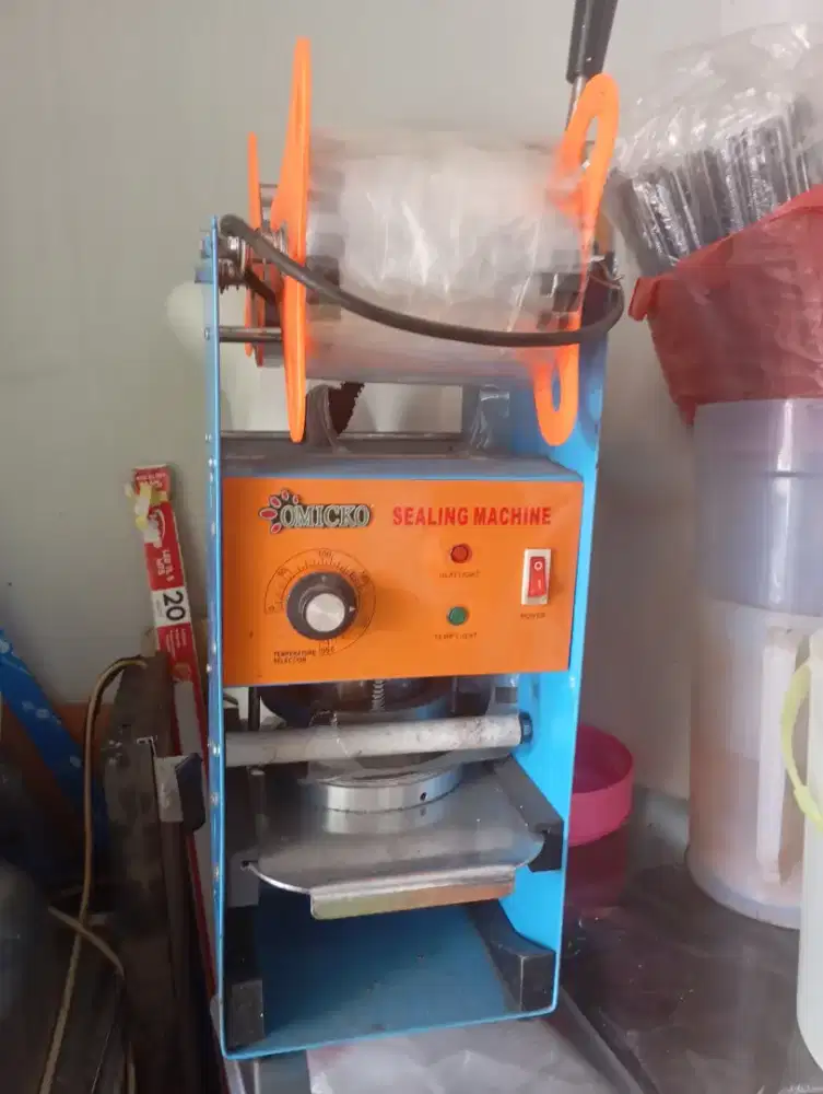 Cup sealler merk Omicko