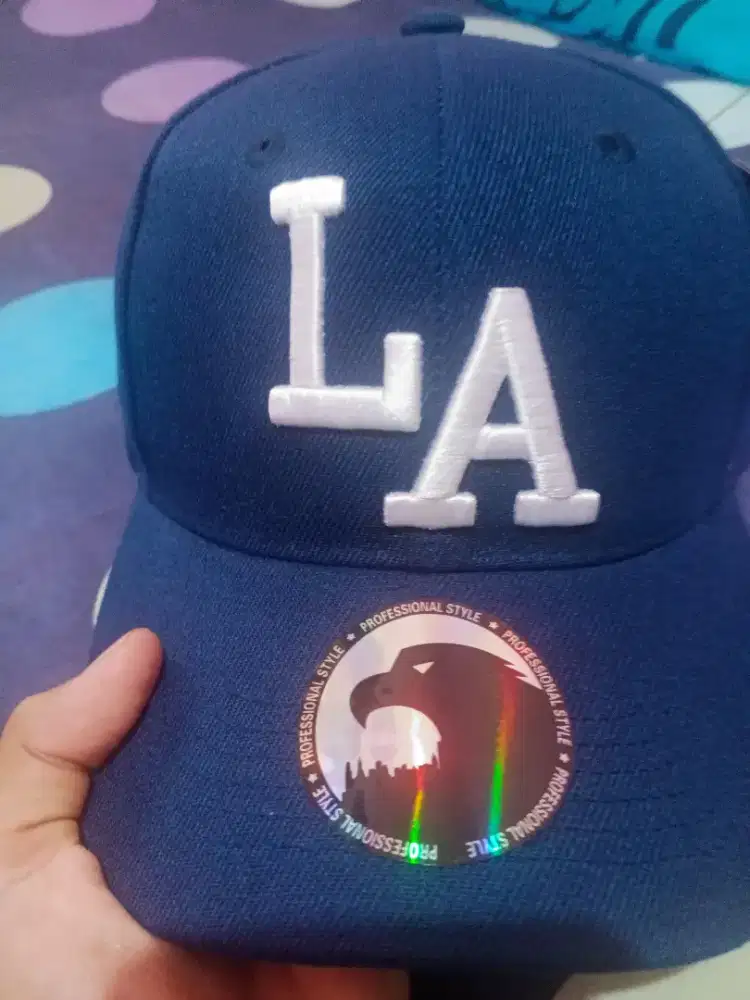 Topi La new era masih baruuu