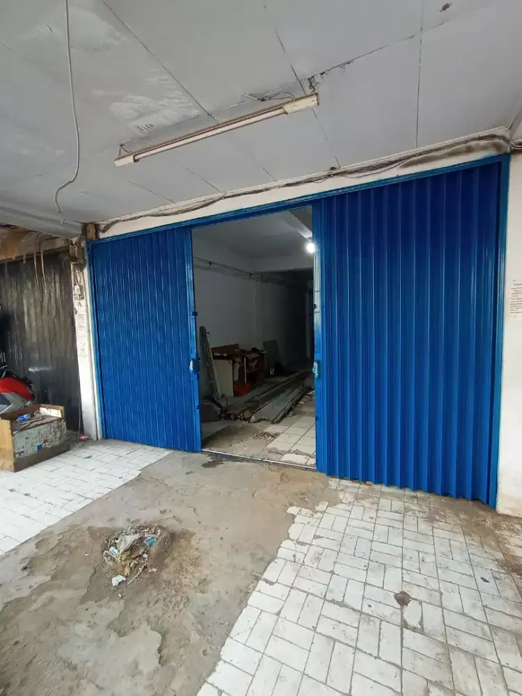 Rolling door folding gate