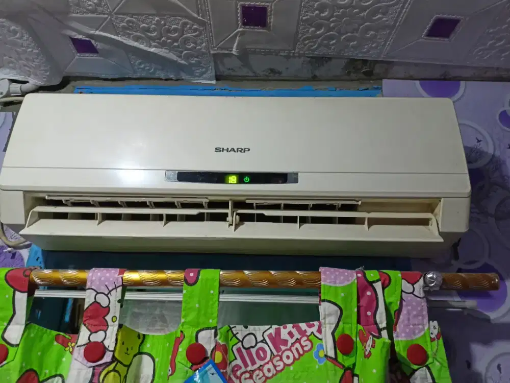 DIJUAL AC SHARP ½PK