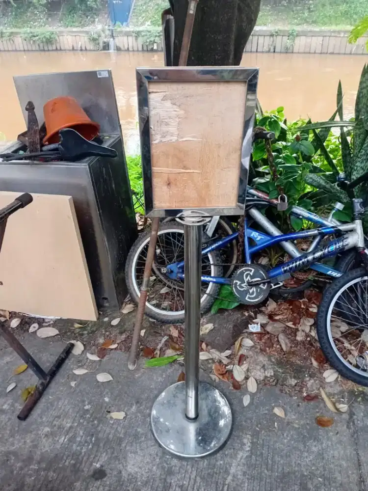 Standing stainless signed