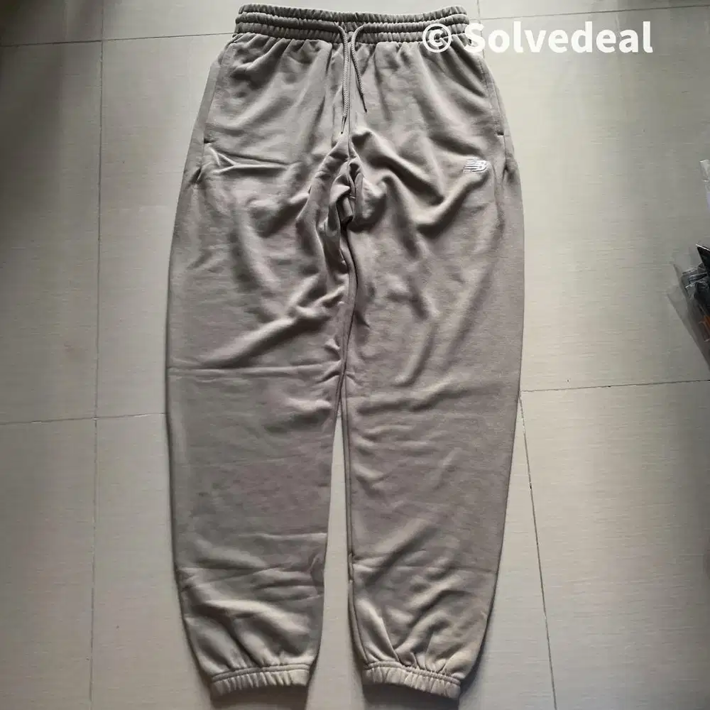 Celana New Balance Sport Essentials French Terry Jogger Mens Beige