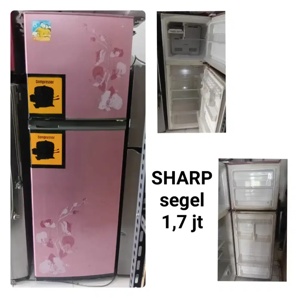 Kulkas 2 pintu seken bergaransi.