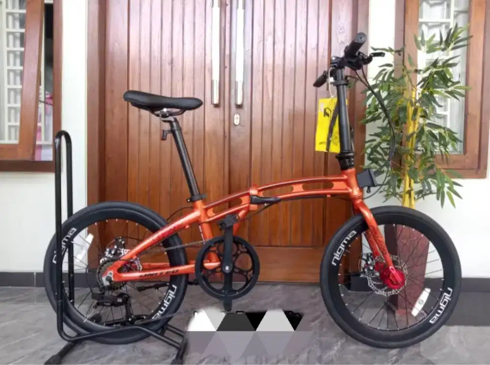 Sepeda Lipat Nigma II uk20 sudah frame alloy, cakram, dan 8speed
