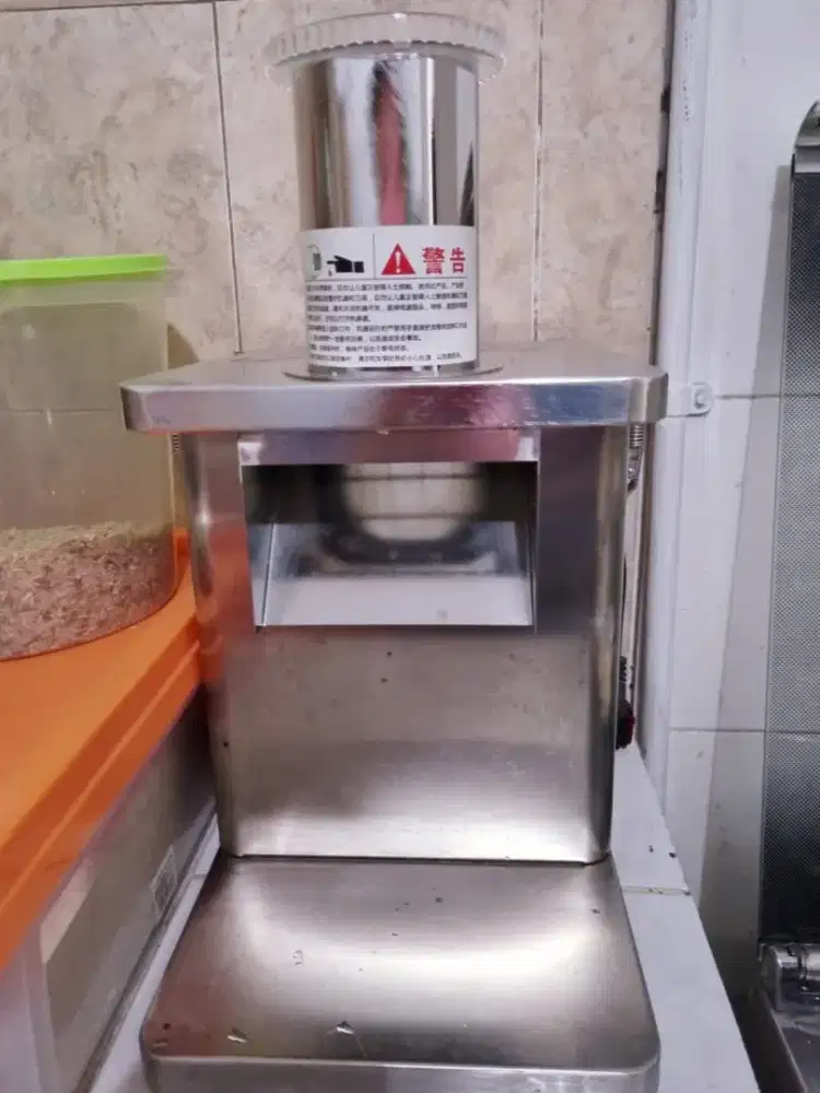 Mesin pemotong sayur listrik