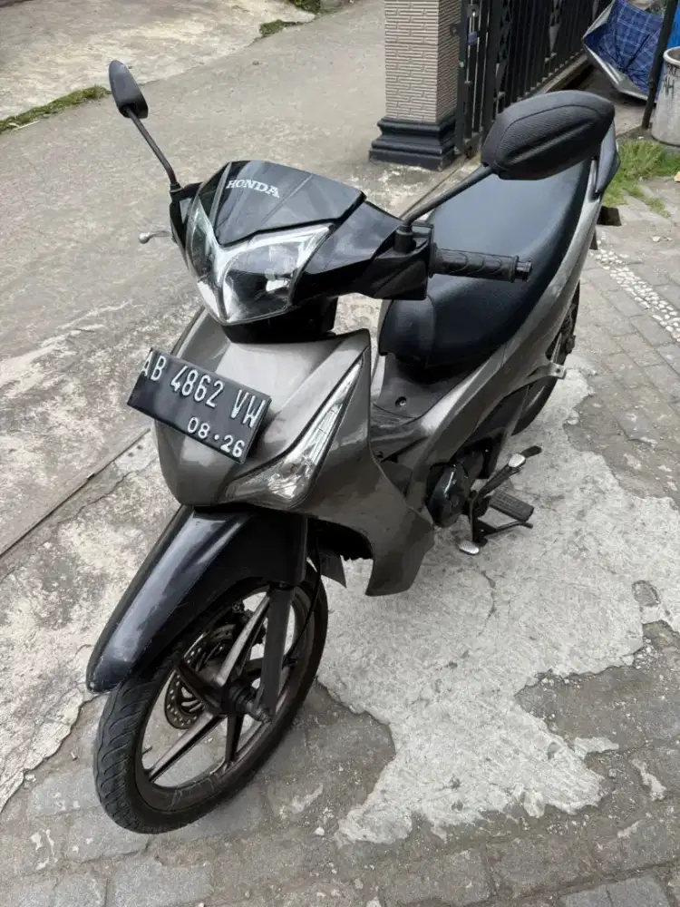 Supra helm in injeksi THN 2012 plat AB Wonosari