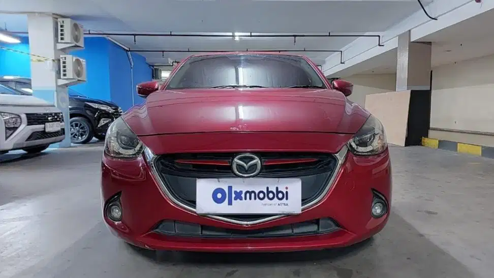 TDP 8,JT Mazda 2 1.5 R Skyactiv Bensin-AT Merah 2015