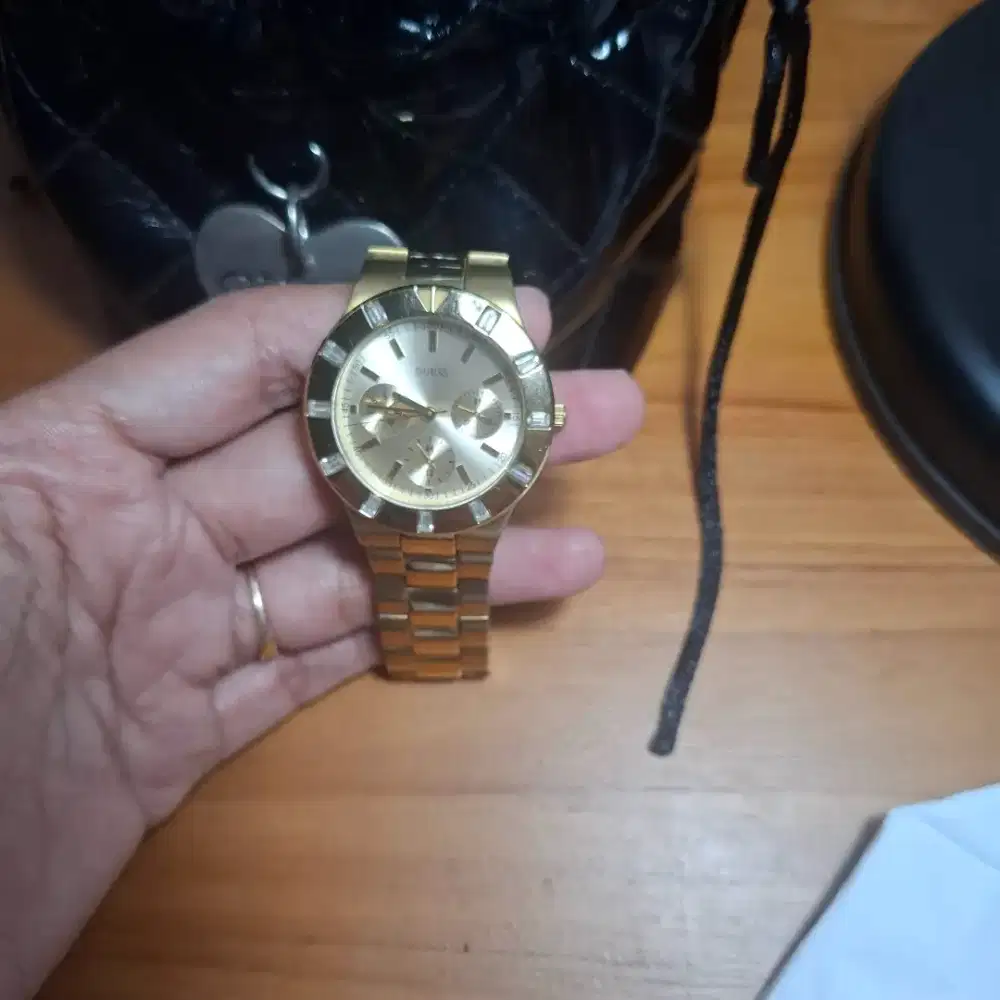 Jam guess wanita ori