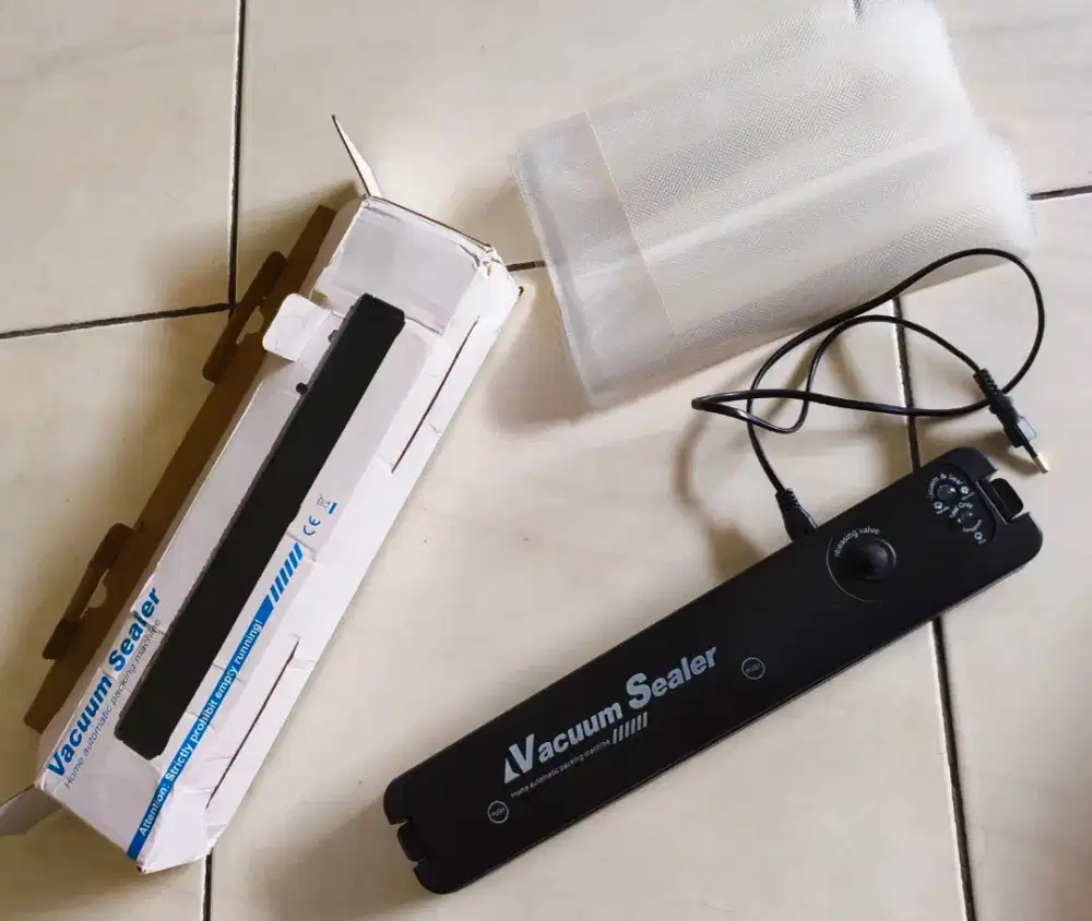 Vacuum sealer untuk rumah tangga