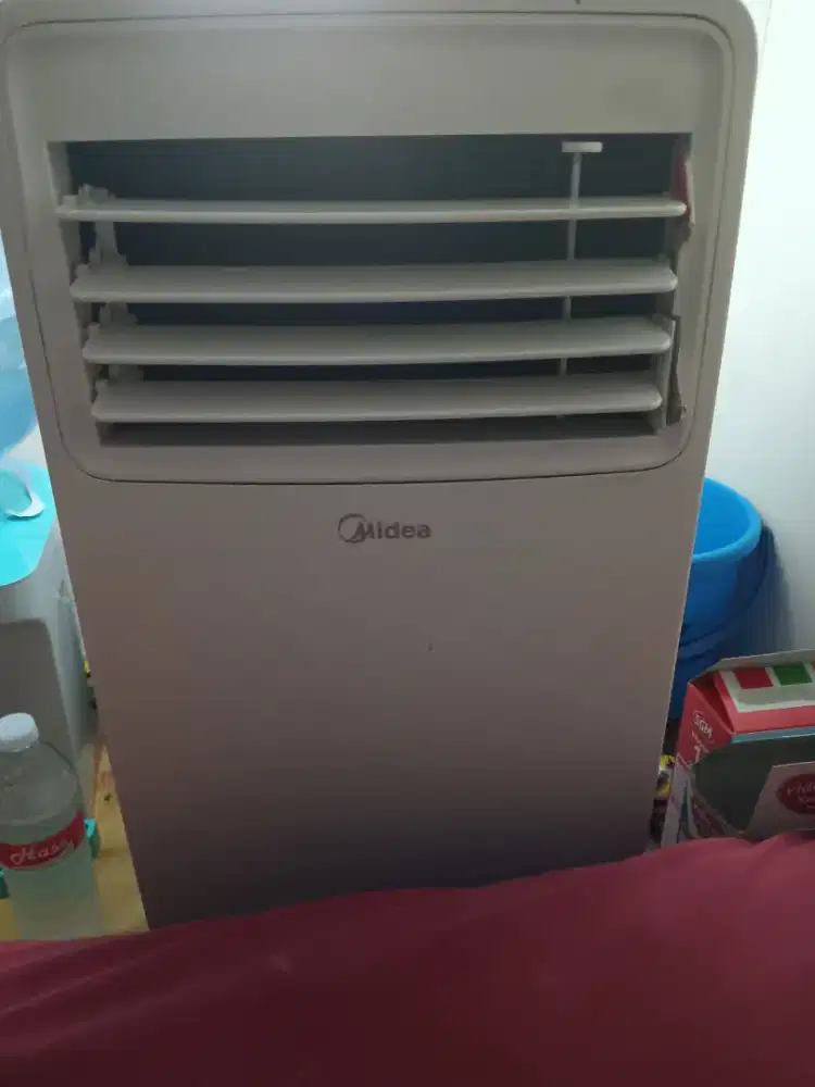 AC portable 1/2pk Merk Midea