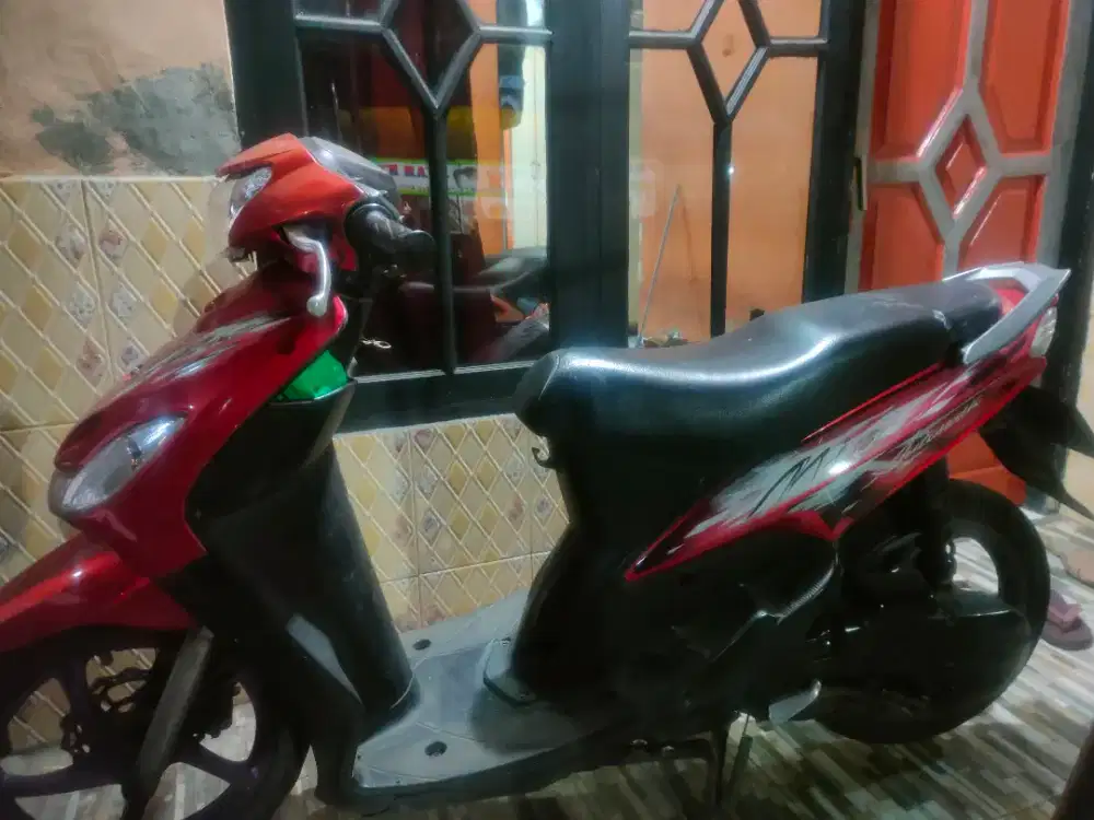 Mio smile tahun 2011 merah