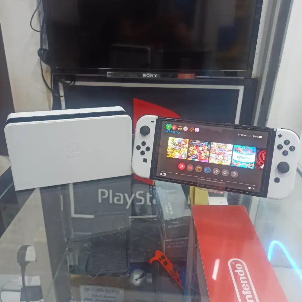 NINTENDO SWITCH OLED 512GB PLUS GAMES