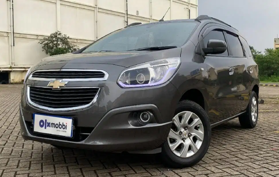 TDP 4,JT Chevrolet Spin 1.3 LTZ Solar-MT Merah 2013