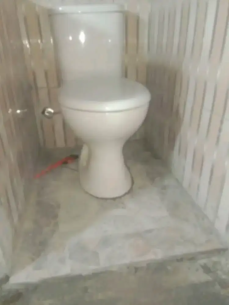 Kuli bangunan dan tukangnya