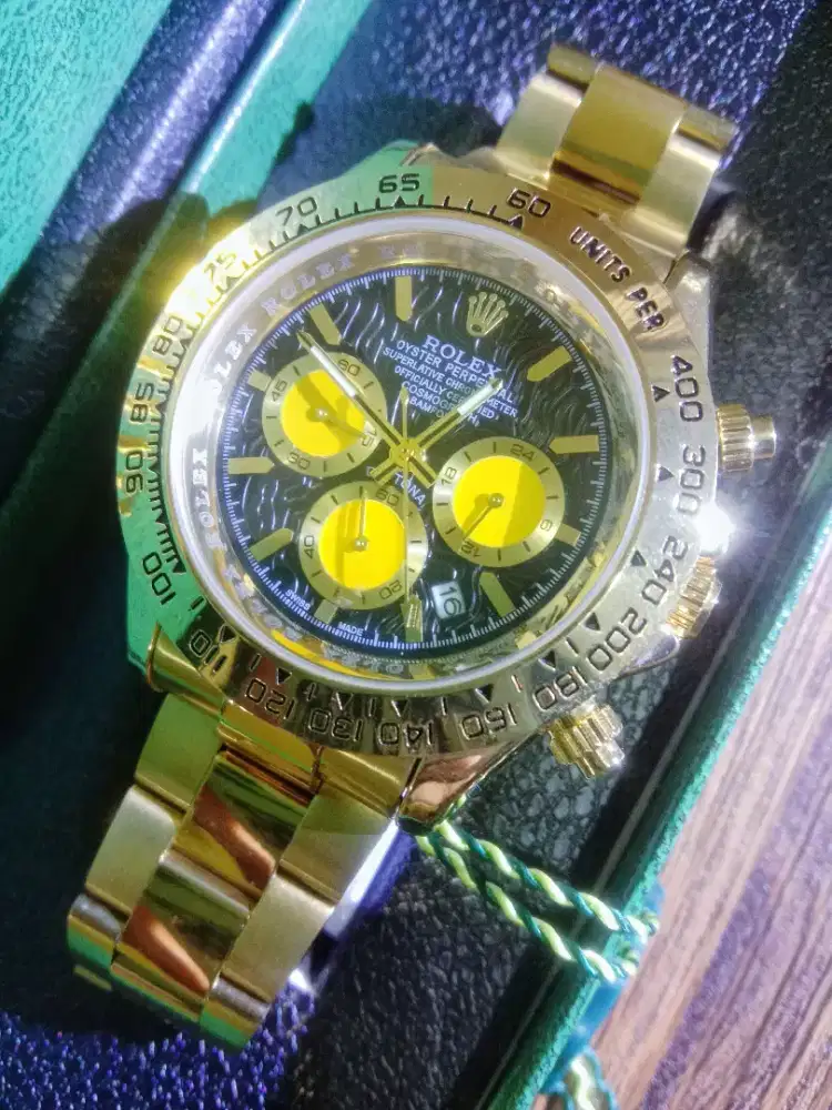 Rolex daytona bamford oiyester gold case
