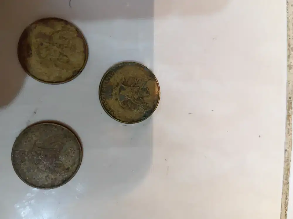 Uang koin 50 gambar komodo