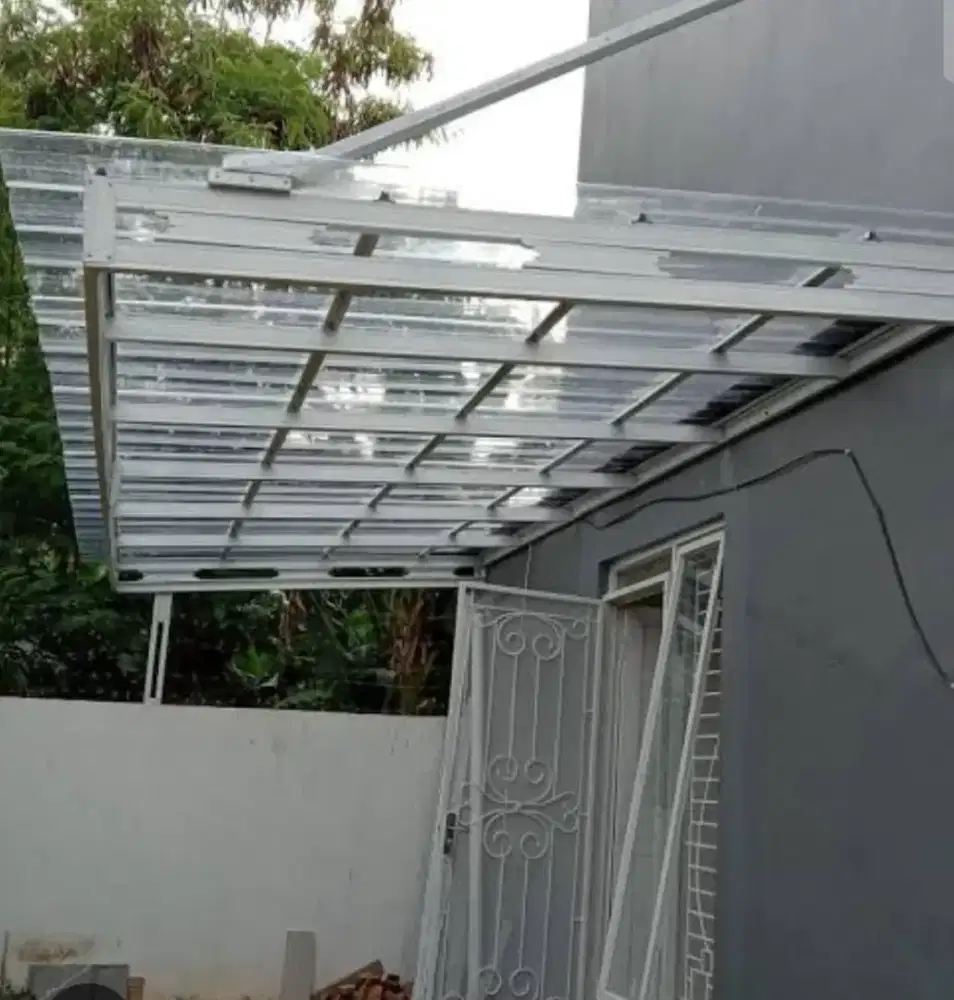 Kanopi bajaringan atap spandek transparan