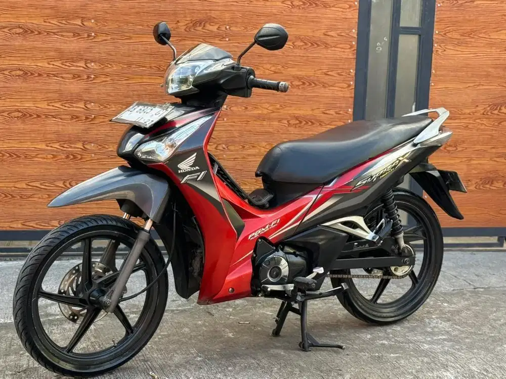 Supra 2012 helm in bagus