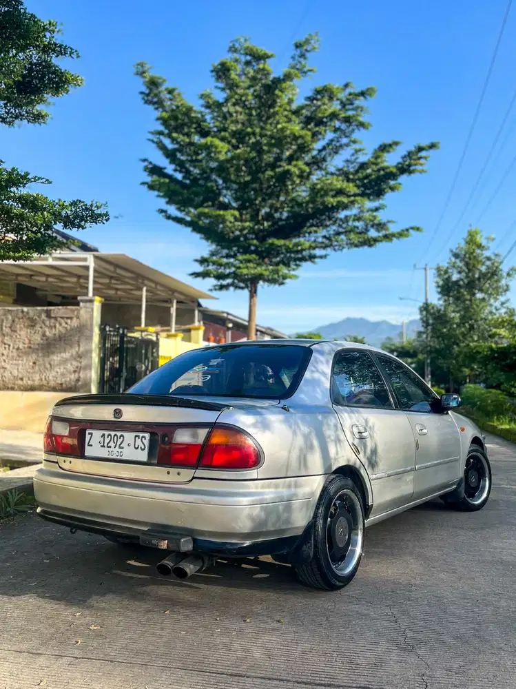 Mazda Familia injeksi pajak isi Ac Ps Pw Usb surat lengkap