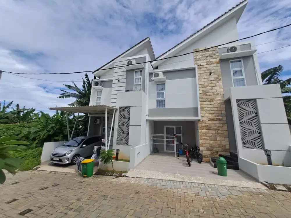 Rumah Depok di cluster Medina Townhouse Depok Desain minimalis elegan SHM IMB Ready dekat Stasiun Tol dekat Jakarta Selatan akses mudah ke Jabodetabek