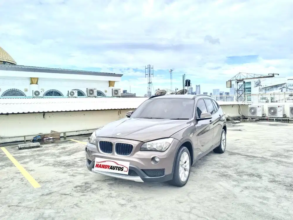 BMW X1 Executive Bensin Tahun 2013 Automatic Coklat Metalik