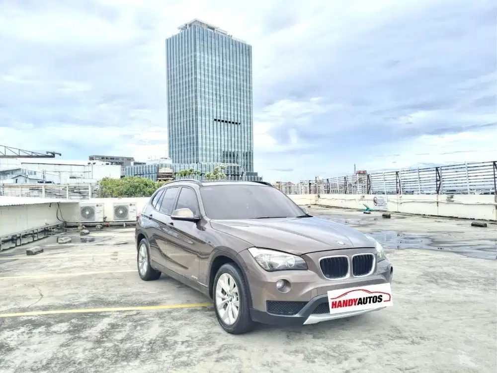 BMW X1 Executive Bensin Tahun 2013 Automatic Coklat Metalik