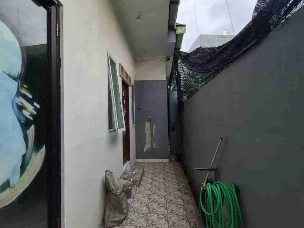 DIJUAL RUMAH LOKASI JALAN SARIDANA CARGO